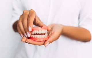 Dentures vs Dental Implants