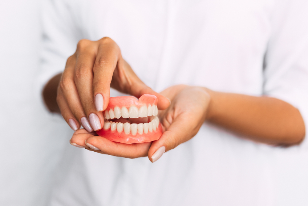 Dentures vs Dental Implants